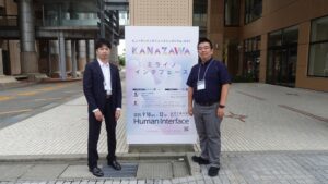 共著者のNTTテクノクロス株式会社の山田さんと記念撮影