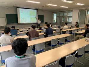 沖准教授の発表の様子です。